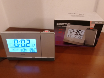 Prodajem mali projektor za vrijeme i temp.